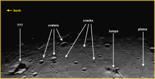 Illustration for article titled Charon Poses a Geomorphic Riddle: How do You Make a Mountain in a Moat?